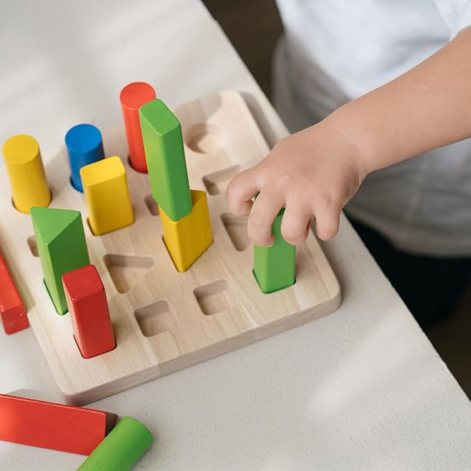 PlanToys® Geometric Peg Board Wooden Shape Sorting Toy for Kids Ages 2+ | wooden geometric peg board, shape sorting stacking, montessori STEM toy, fine motor color learning coordination, kids ages 2+