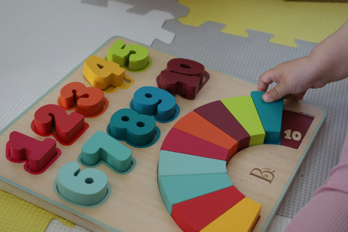 kids learning numbers with wooden counting puzzle, hands-on math toy for children