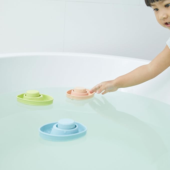 PlanToys® Pastel Green Rubber Convertible Boat Water & Sensory Play Toy | pastel green rubber convertible boat, montessori water bath play, cause effect imagination exploration, floating toy, toddler