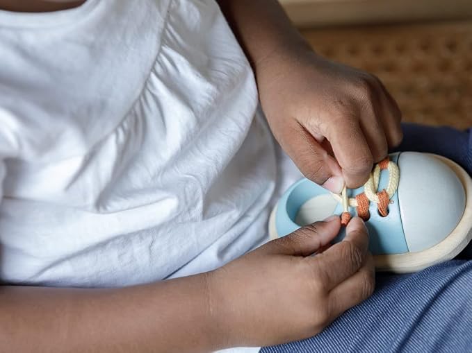 PlanToys® Wooden Shoe Tying Practice Toy for Kids | Montessori Lacing Activity for Toddlers & Preschool | Learn to Tie Shoelaces | Travel-Friendly Educational Toy