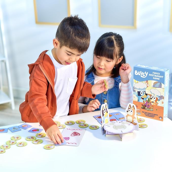 Bluey Fancy Restaurant Game, Join and Bingo as They Match Food Cards to Help Dad Prepare a Special Dinner for Mum, Serve up Fun While Building Memory and Matching Skills, Ages 3+, 2–4 Players | Based on the Fancy Restaurant episode, 2-4 players; family...