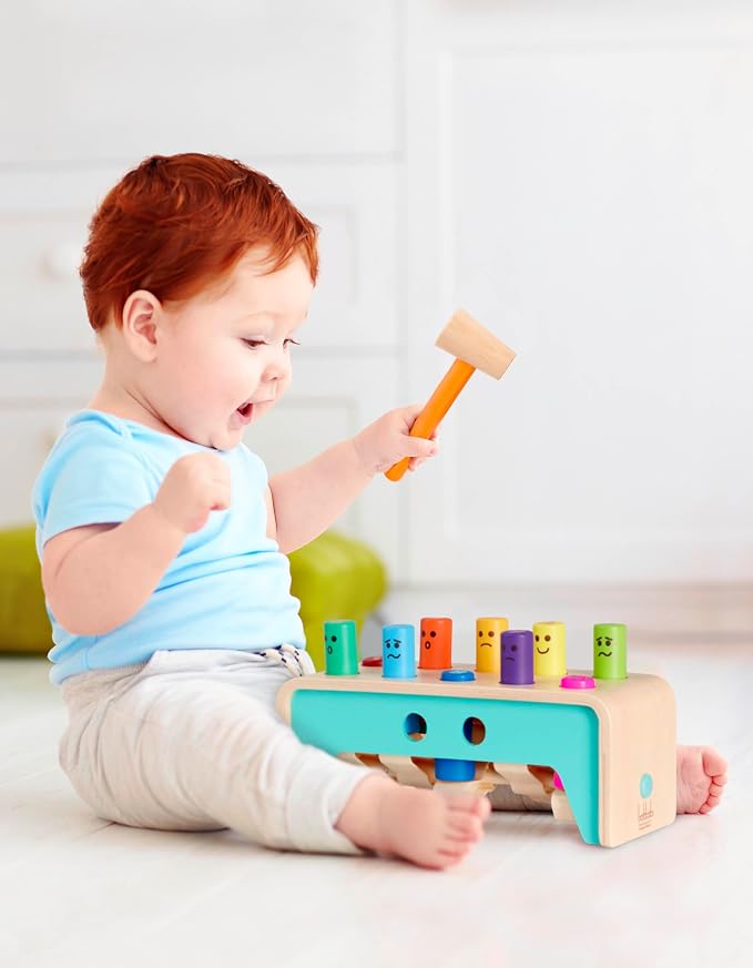 Battat Wooden Pounding Bench Toy with Mallet, Pound & Count Bench | Wooden pounding bench with 10 colorful pegs and 1 mallet for numbers, colors, and emotions; side mallet storage; 1+ Years