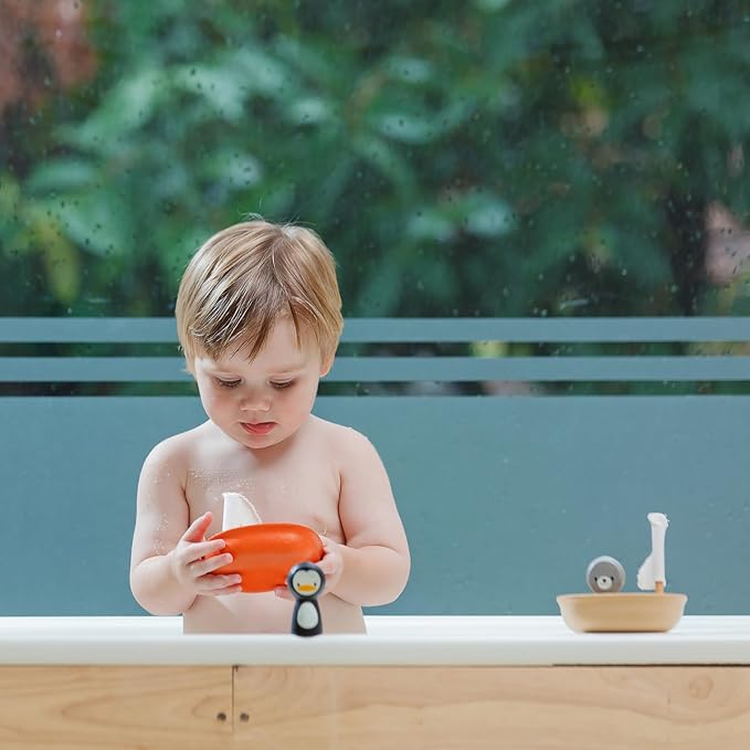 PlanToys® Wooden Sailing Boat Toy with Seal, Kids Bath Time Water Play Toy | wooden sailing boat with seal, bath time water play, floating imaginative toy, gentle sensory exploration, kids toddlers play