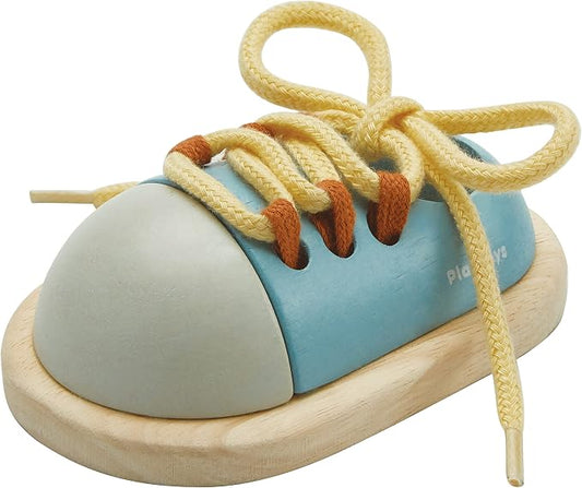 PlanToys® Wooden Shoe Tying Practice Toy for Kids | Montessori Lacing Activity for Toddlers & Preschool | Learn to Tie Shoelaces | Travel-Friendly Educational Toy