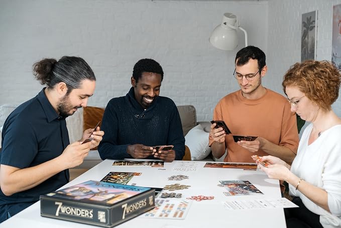 Asmodee 7 Wonders Board Game (New Edition) - Lead Your Civilization to Prosperity, Strategy Game for Kids and Adults, Ages 10+, 3-7 Players, 30 Minute Playtime | Lead your civilization through three Ages and build one of history's greatest wonders. Age...