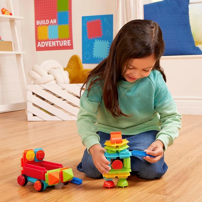 Battat Bristle Blocks Basic Builder Bucket, 50-Piece Building Toys, Playset | Interlocking blocks in bright colors and shapes with wheels for movable builds and easy assembly, 50 Pieces, 2+ Years