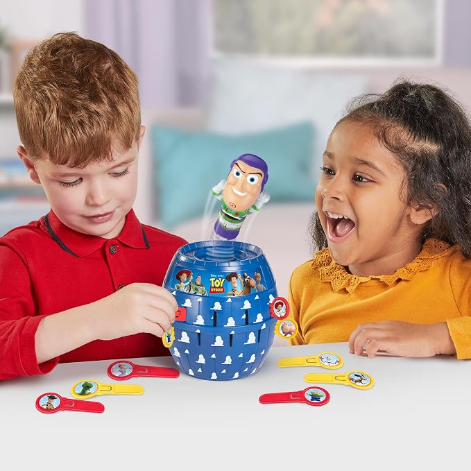 TOMY Pop Up Buzz Lightyear Game, Toy Story Action Game for Kids, Funny jousting game with sticks, Disney Pixar Buzz Lightyear Family Game, Quick Response Game for 2-4 Players, Ages 4+