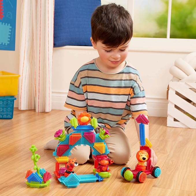 Battat Bristle Blocks Jungle Adventures, 54-Piece STEM Building Set | STEM interlocking stacking blocks with toy animals, flowers, wheels, and reusable storage bucket for pretend play, 2+ Years